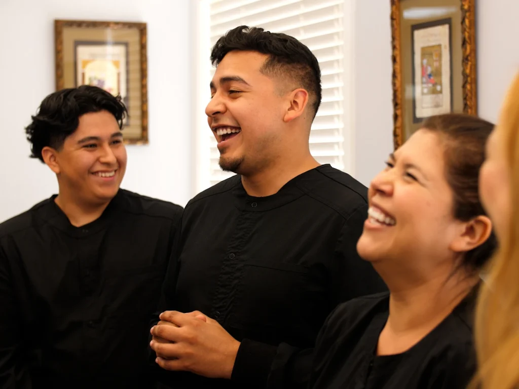 Sugarloaf Smiles staff laughing together